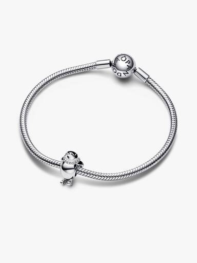 Síelő pingvin charm