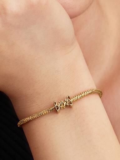 Besos felirat charm